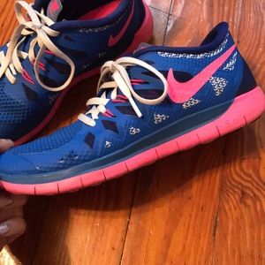 Pink and blue Nike Frees